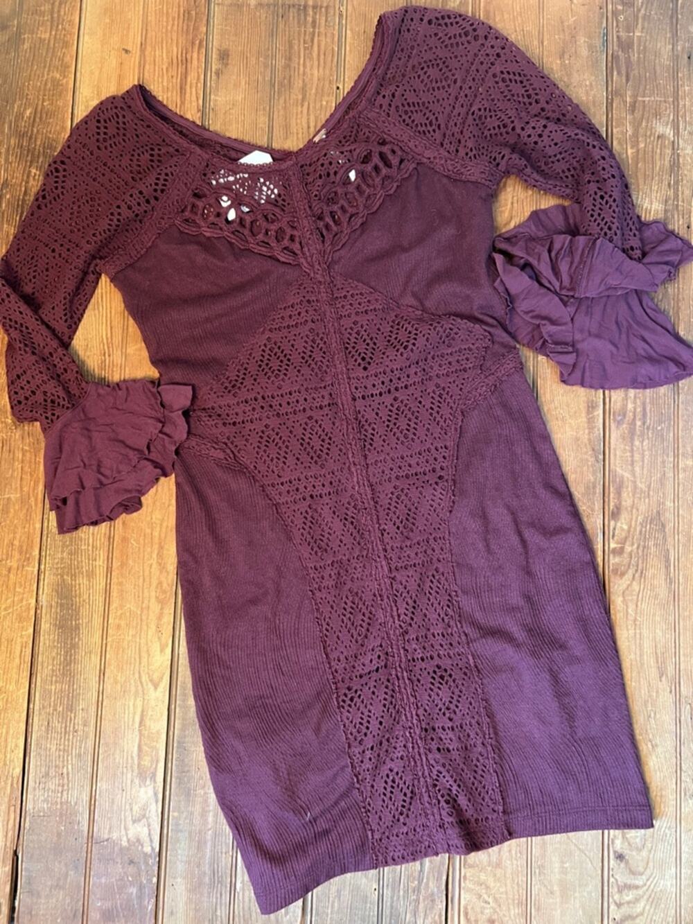 Free People dress lace cut out, bell sleeves, mid length, ruffles in plum boho